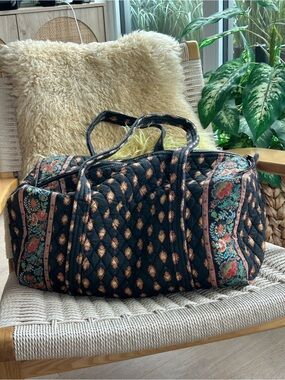 Maggi B Quilted Black Floral Medium size Weekender Bag
Front zip pocket, roomy.